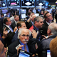 The markets react: Photo credit AP/Spencer Platt